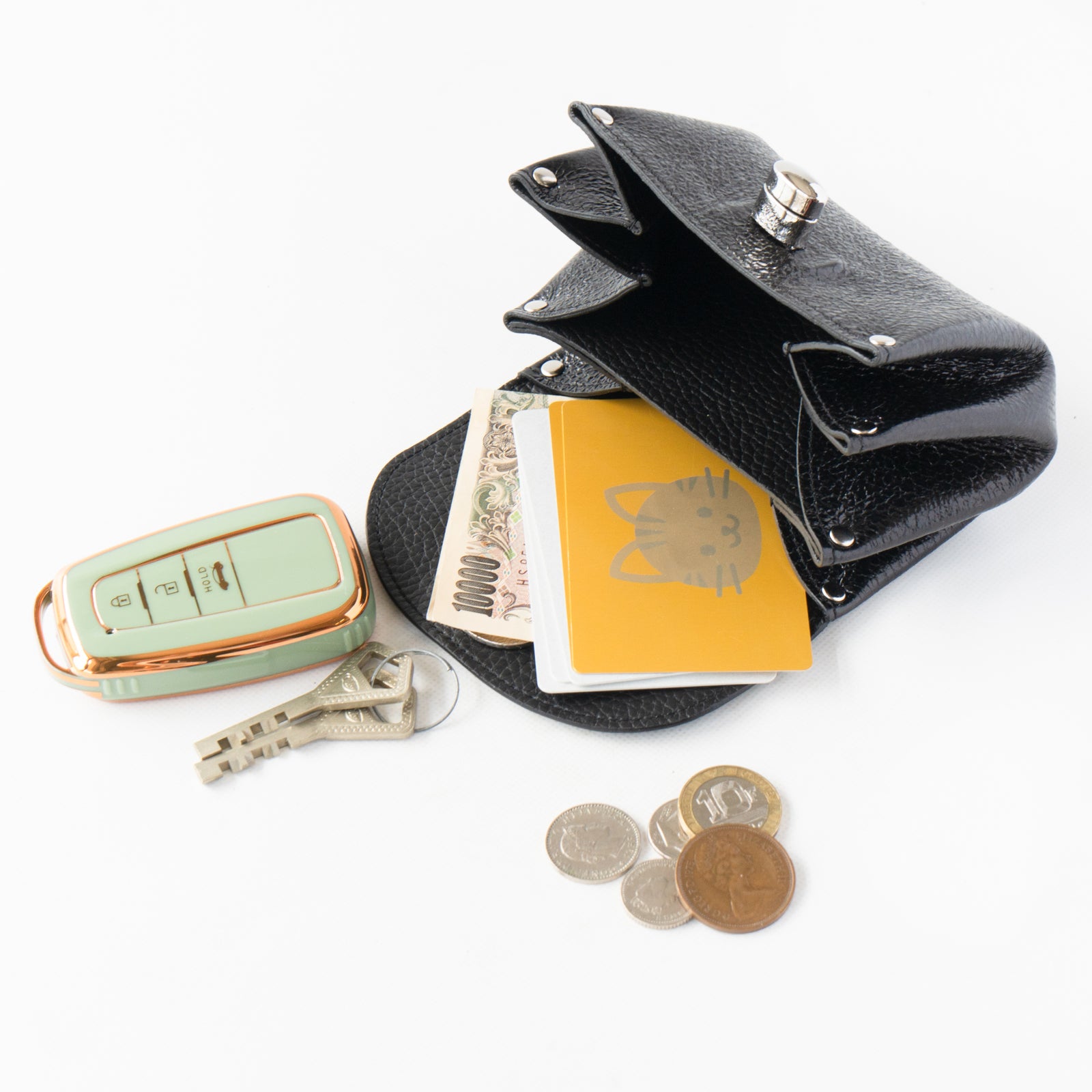 Shell pouch CAT Prism leather / Black